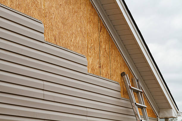 Professional Siding Installation technician working in Lincoln, MA